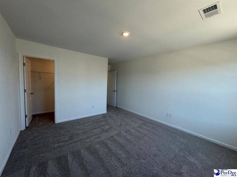 Spacious, unfurnished interior of a new home in The Grove, Florence (Image 34).