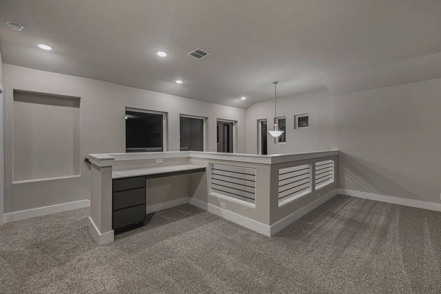 Representative furnished interior of a home built from the Jordy by Chesmar Homes in Stillwater Ranch, Buda (Image 9).