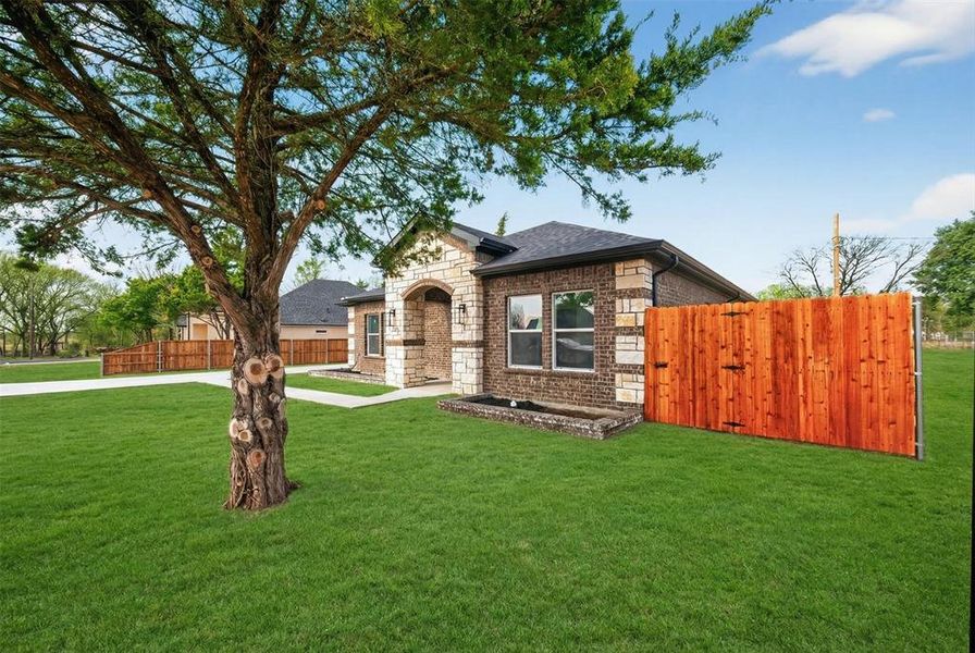 Front exterior of a new home in , Glenn Heights, TX, highlighting curb appeal (Image 2). Front exterior of a new home in , Glenn Heights, TX, highlighting curb appeal (Image 2).