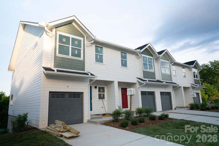 Front exterior of a new home in , Asheville, NC, highlighting curb appeal (Image 5). Front exterior of a new home in , Asheville, NC, highlighting curb appeal (Image 5).