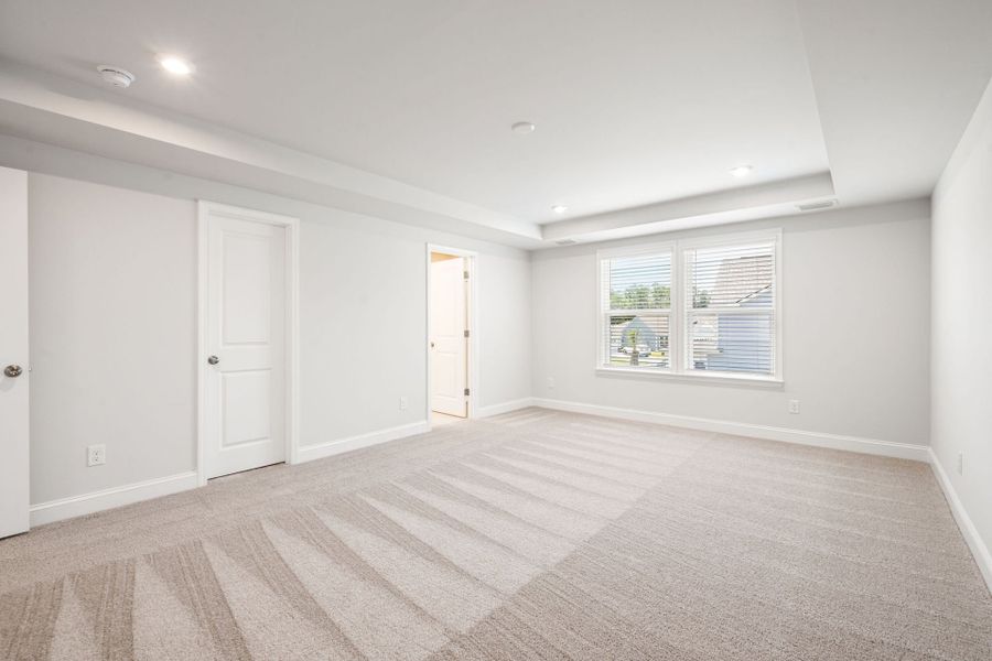 Spacious, unfurnished interior of a new home in Waterways, Richmond Hill (Image 38).