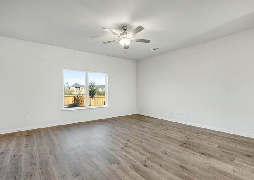 The family room of the Driftwood is spacious and has large windows.