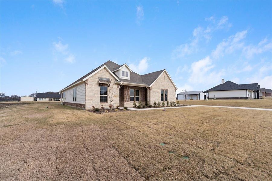Exterior details and patio area of a home in Nash Estates, Tom Bean (Image 30). Exterior details and patio area of a home in Nash Estates, Tom Bean (Image 30).