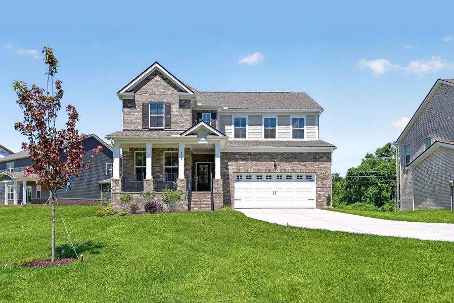 Front exterior of a new home in Wembley Estates, Nashville, TN, highlighting curb appeal (Image 1). Front exterior of a new home in Wembley Estates, Nashville, TN, highlighting curb appeal (Image 1).