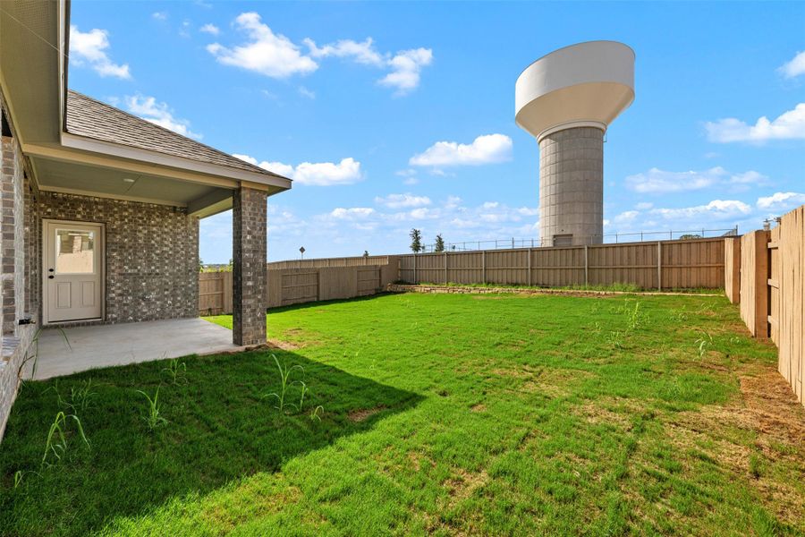 Exterior details and patio area of a home in The Colony, Bastrop (Image 2). Exterior details and patio area of a home in The Colony, Bastrop (Image 2).