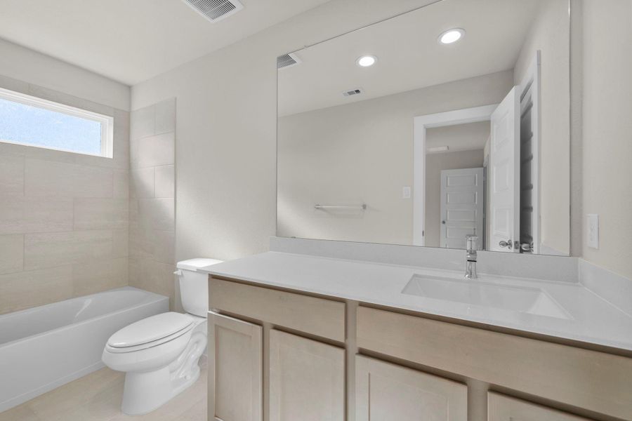 Furnished interior view inside a new home in Barton Creek Ranch, Conroe (Image 10).