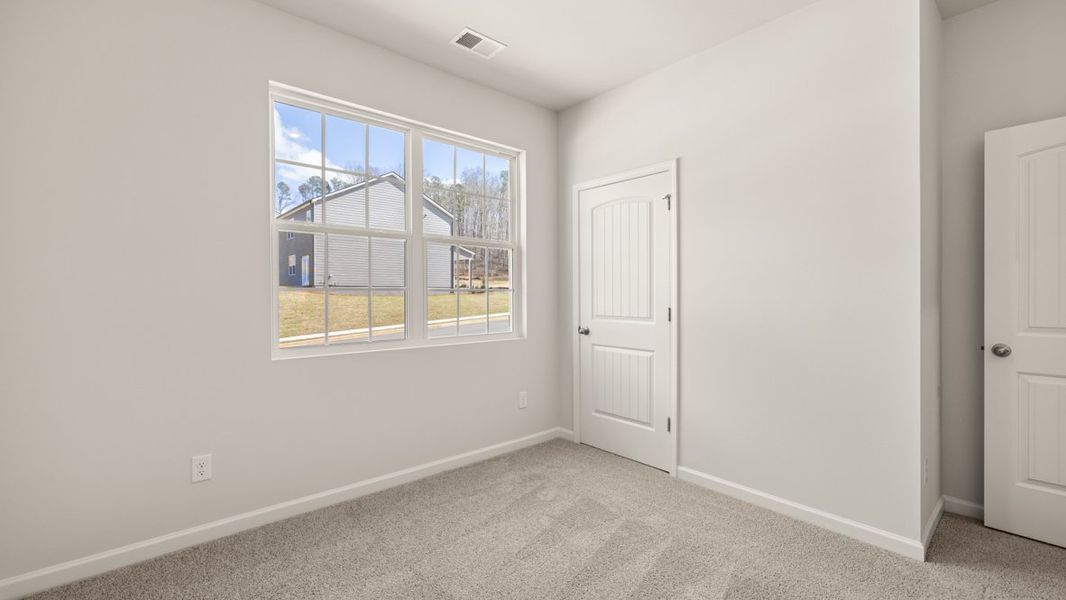 Representative unfurnished interior of a home built from the Cali by D.R. Horton in South Wind, South Fulton (Image 29).