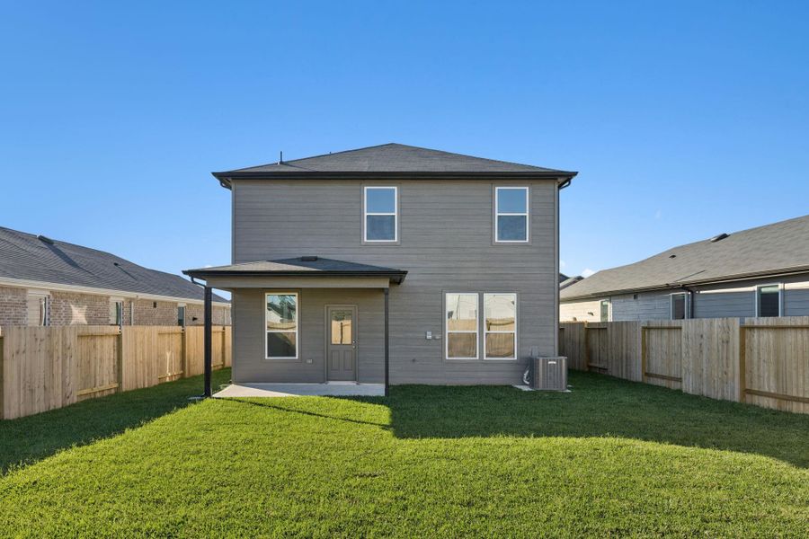 Exterior details and patio area of a home in Montgomery Bend, Montgomery (Image 3).