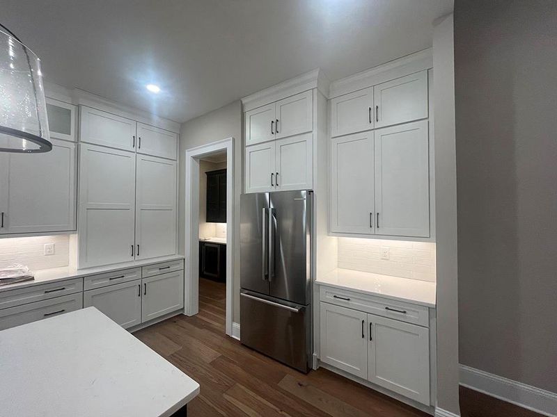 Furnished interior view inside a new home in , White (Image 43).