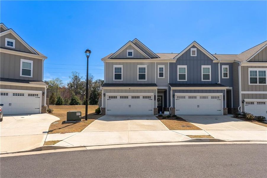 Front exterior of a new home in , Sugar Hill, GA, highlighting curb appeal (Image 2). Front exterior of a new home in , Sugar Hill, GA, highlighting curb appeal (Image 2).