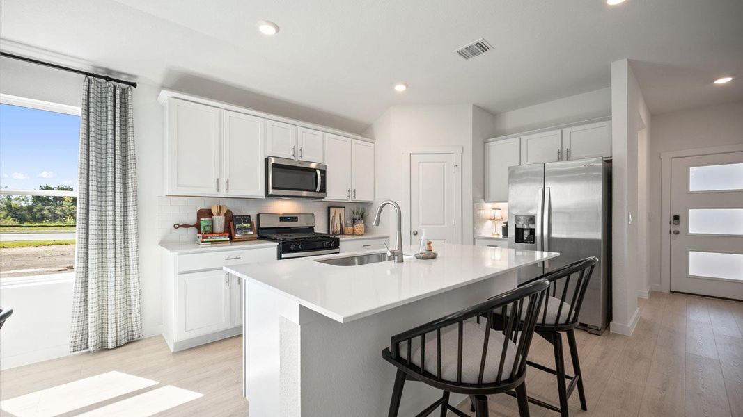 Furnished interior view inside a new home in Trails at Wildhorse, Austin (Image 13). Furnished interior view inside a new home in Trails at Wildhorse, Austin (Image 13).