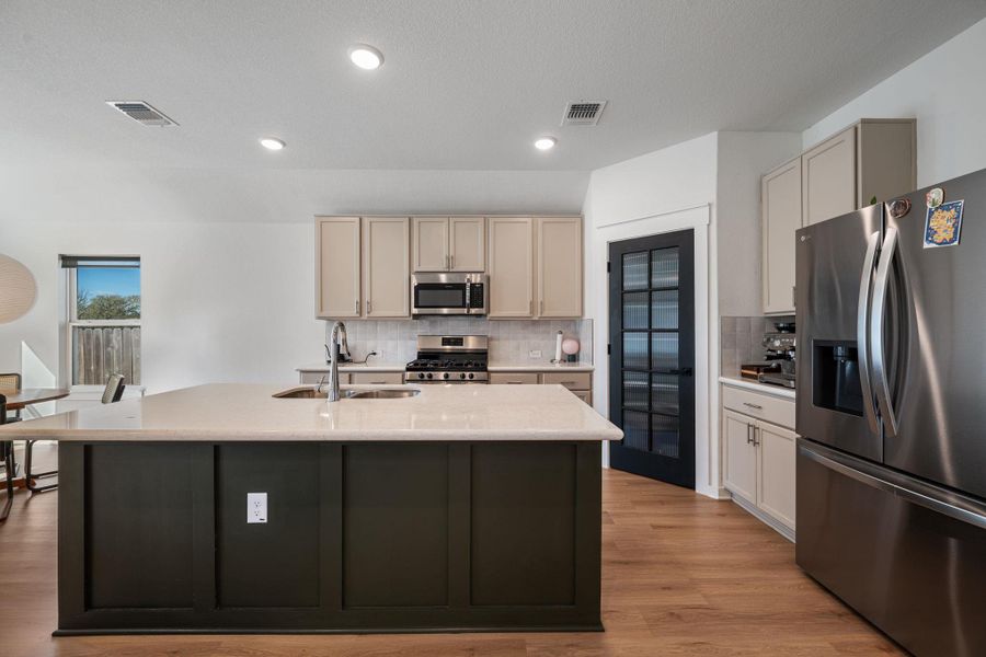 Furnished interior view inside a new home in Sun Chase, Del Valle (Image 10). Furnished interior view inside a new home in Sun Chase, Del Valle (Image 10).