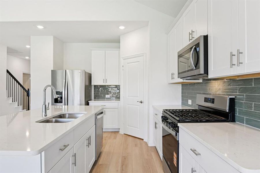Photo is not of the actual home, but is an inspirational photo of builder’s model home and may depict options, furnishings, and/or decorator features that are not included.