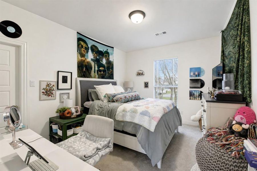 Bedroom #4, upstairs, features an ensuie bath that also opens to the study nook.