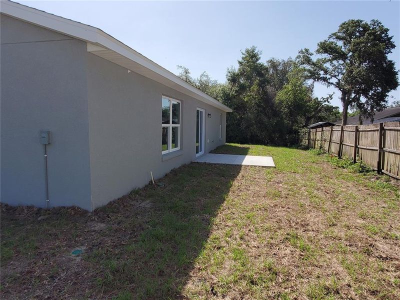 Front exterior of a new home in , Ocklawaha, FL, highlighting curb appeal (Image 20).
