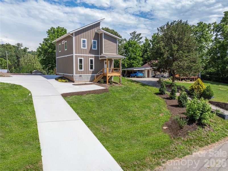 Front exterior of a new home in , Asheville, NC, highlighting curb appeal (Image 2). Front exterior of a new home in , Asheville, NC, highlighting curb appeal (Image 2).