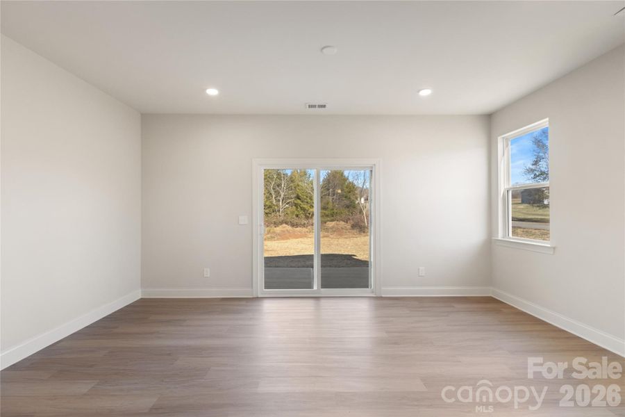 Living room area with view of back porch