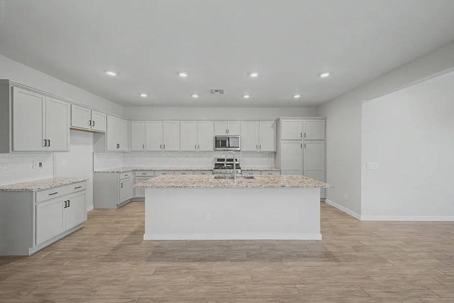 Furnished interior view inside a new home in Avanti at Granite Vista, Waddell (Image 7).