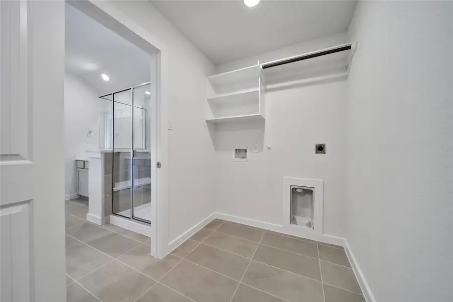 Furnished interior view inside a new home in Roman Forest, New Caney (Image 7).