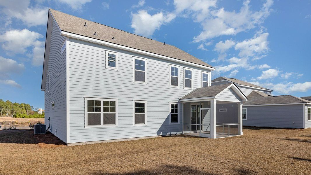 Exterior details and patio area of a home in The Preserve at Shaftesbury Glen, Conway (Image 3).