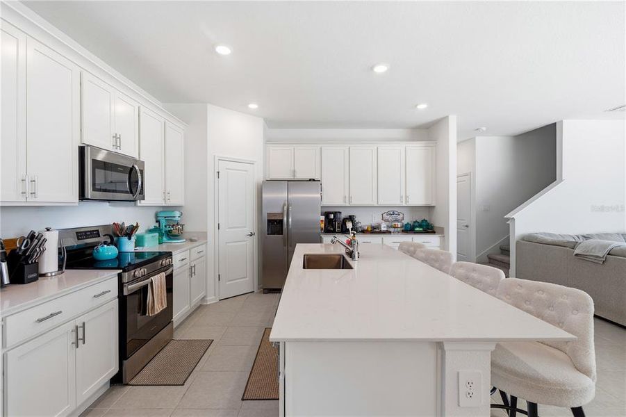 Furnished interior view inside a new home in Wellness Ridge, Clermont (Image 16).