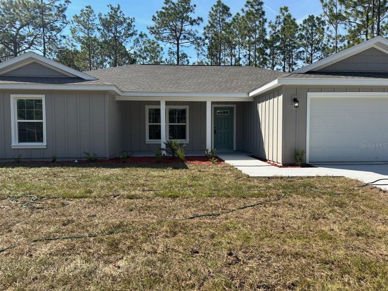 Exterior details and patio area of a home in , Citrus Springs (Image 26).