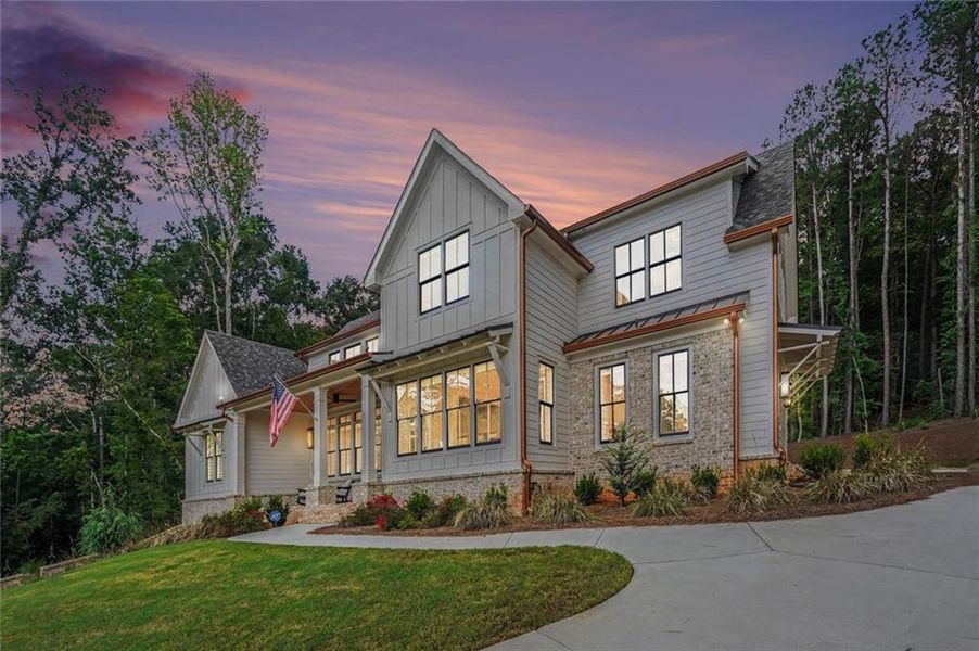 Front exterior of a new home in , Monroe, GA, highlighting curb appeal (Image 1). Front exterior of a new home in , Monroe, GA, highlighting curb appeal (Image 1).