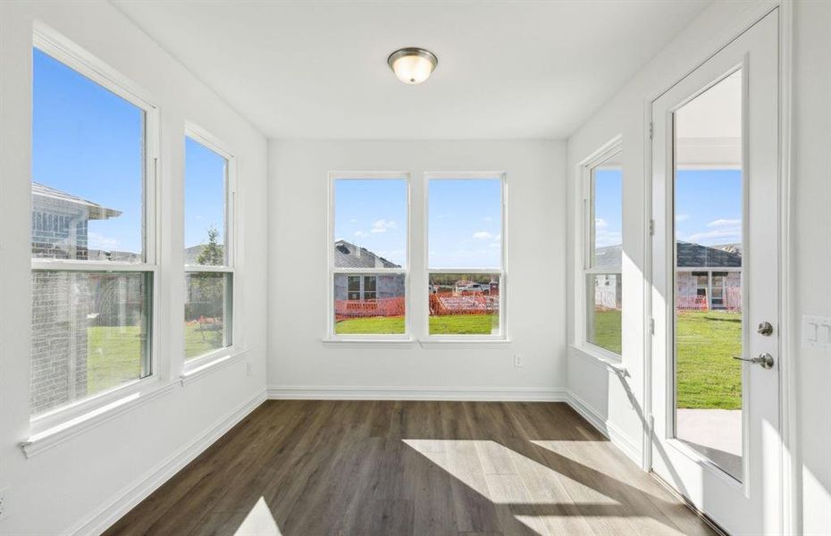 Spacious run room with large windows *real home pictured