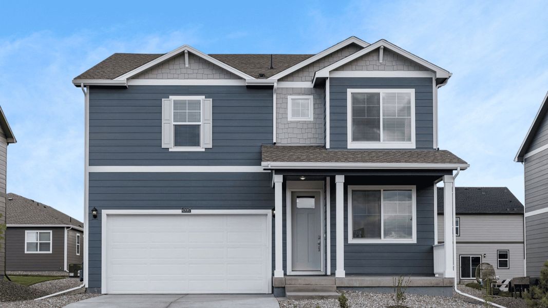 Front exterior of a new home in Lakeside Canyon, Mead, CO, highlighting curb appeal (Image 1). Front exterior of a new home in Lakeside Canyon, Mead, CO, highlighting curb appeal (Image 1).
