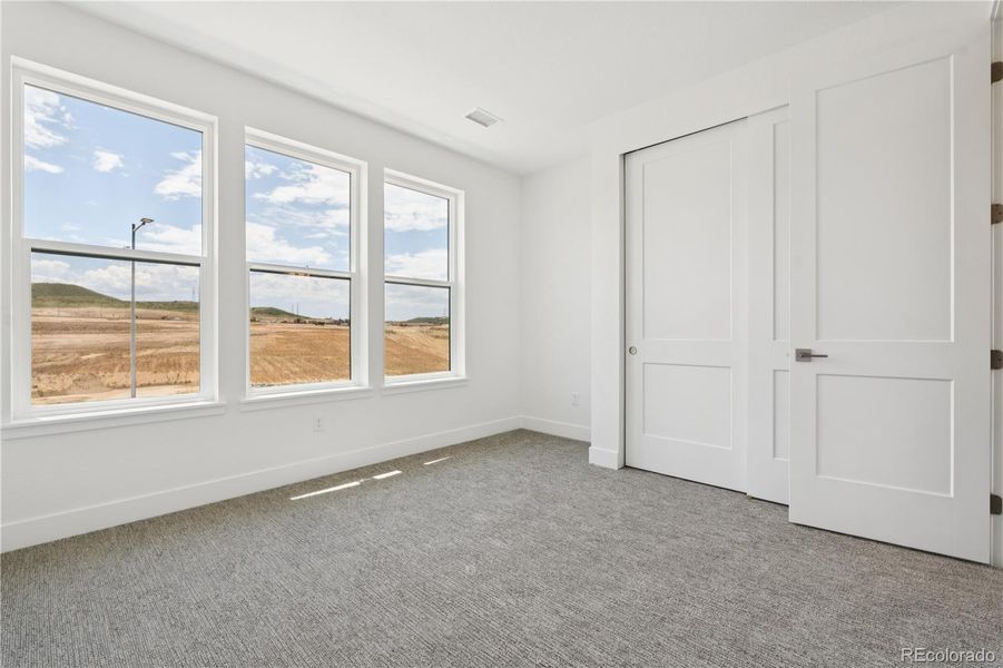 Spacious, unfurnished interior of a new home in Storytellers at Lyric, Lone Tree (Image 44).