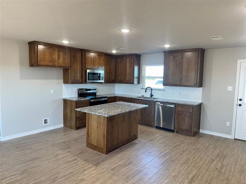 Furnished interior view inside a new home in , Poolville (Image 4).