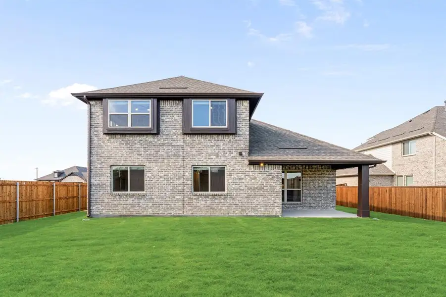 Exterior details and patio area of a home in Sonoma Verde, McLendon-Chisholm (Image 3).