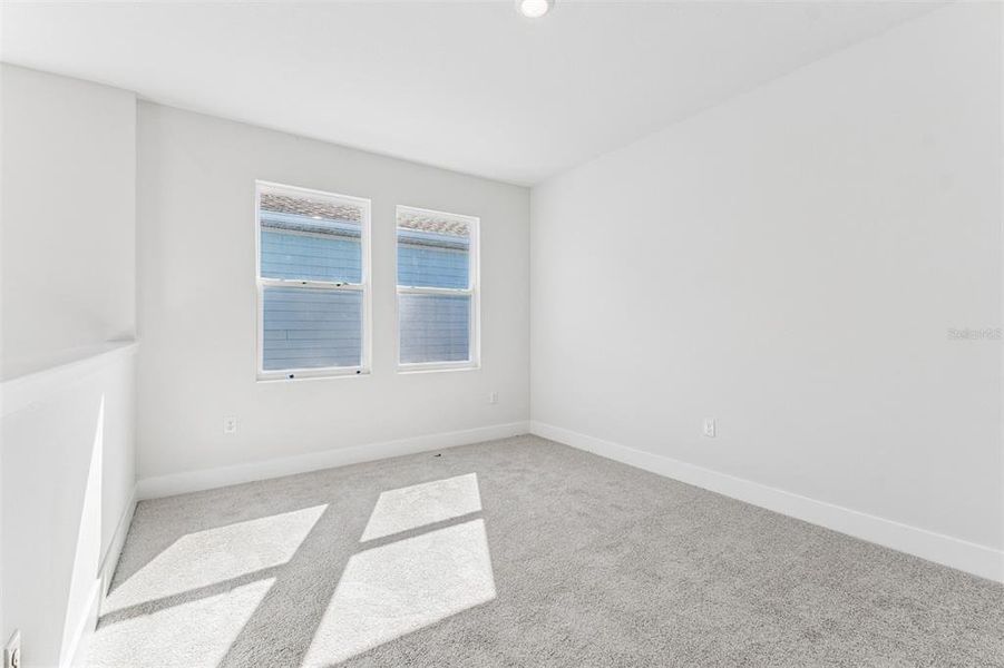 Spacious, unfurnished interior of a new home in Waterset Tradition Series, Apollo Beach (Image 31).