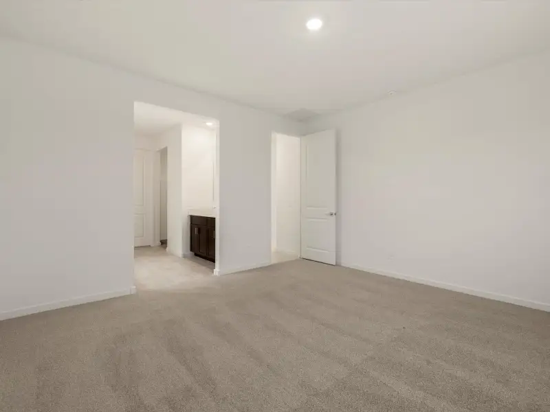 Spacious, unfurnished interior of a new home in Bella Vista Farms Reserve Series, San Tan Valley (Image 12).