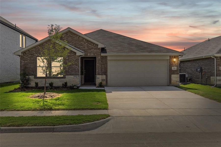 Front exterior of a new home in Stratton Place, Greenville, TX, highlighting curb appeal (Image 19).