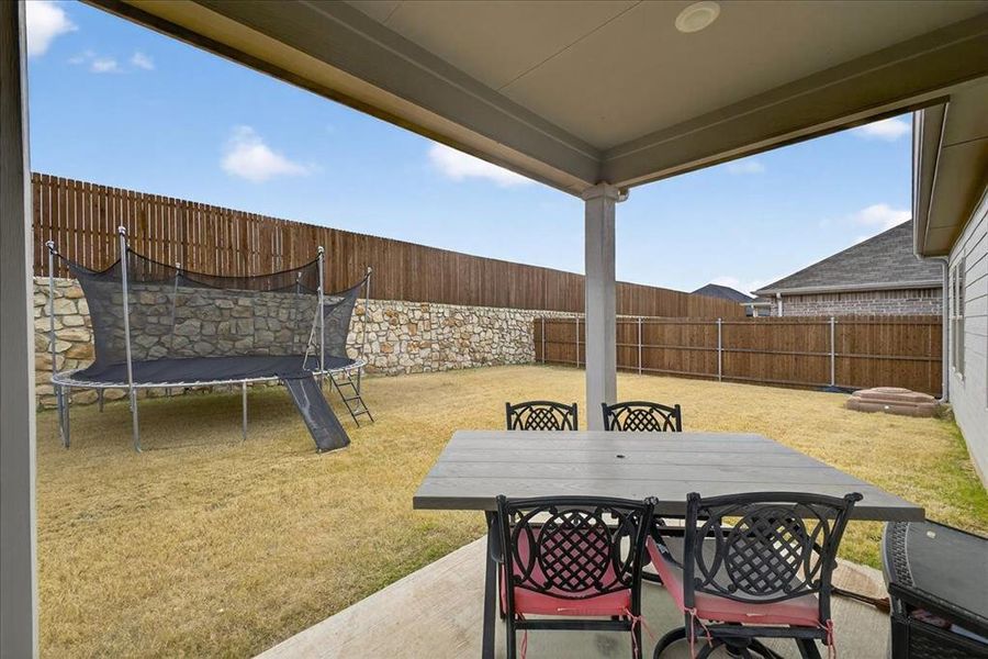 Exterior details and patio area of a home in Tesoro at Chisholm Trail Ranch, Crowley (Image 3).