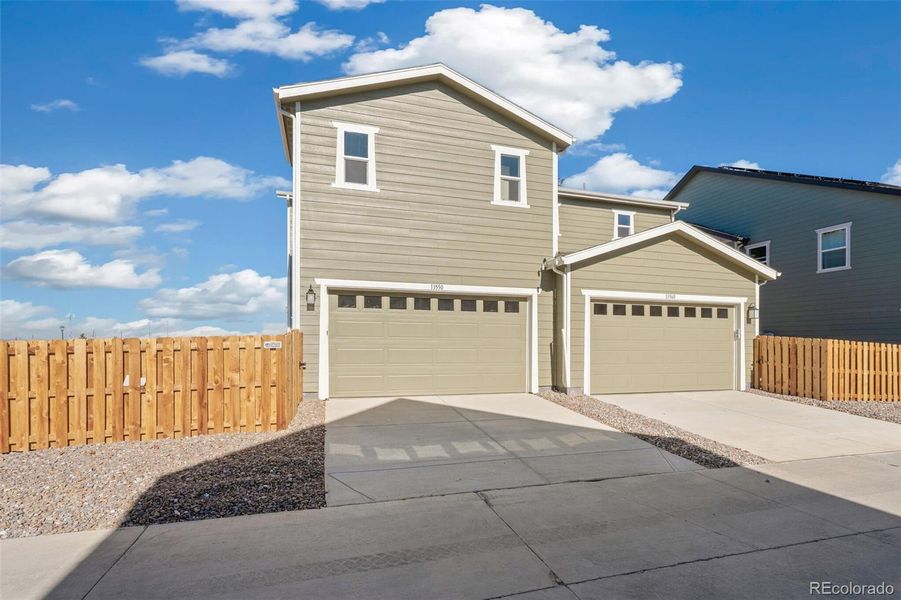 Exterior details and patio area of a home in Turnberry, Commerce City (Image 4).