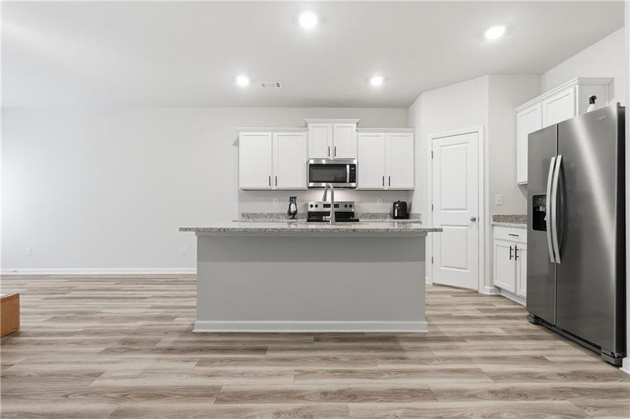 Furnished interior view inside a new home in , Oakwood (Image 18). Furnished interior view inside a new home in , Oakwood (Image 18).