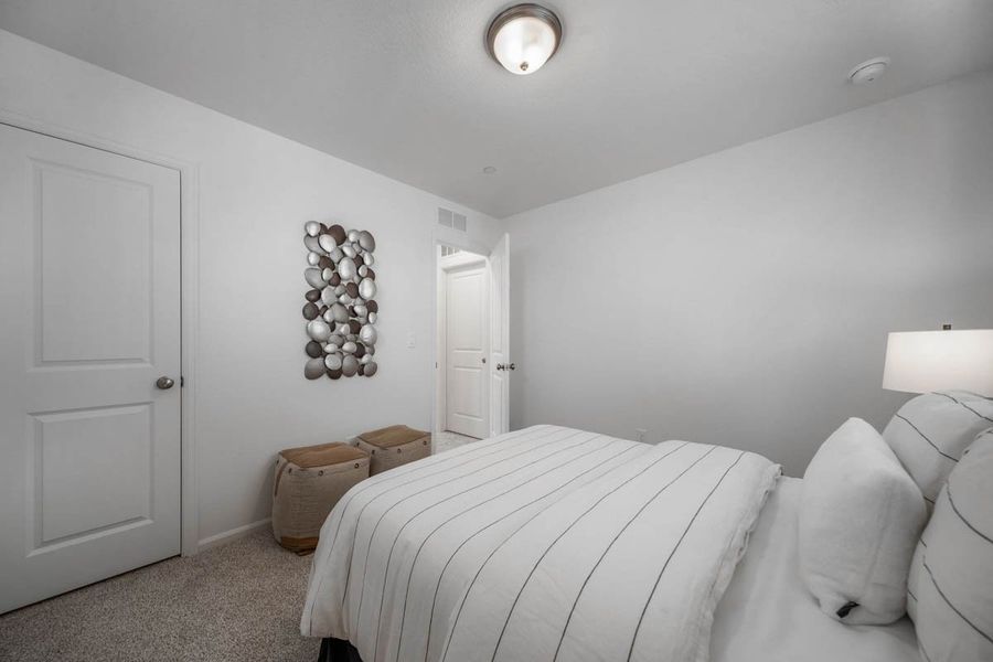 Furnished interior view inside a new home in Reunion, Commerce City (Image 27).
