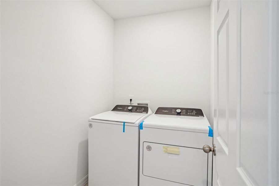 Furnished interior view inside a new home in Lake Deer Estates - Signature Series, Poinciana (Image 5). Furnished interior view inside a new home in Lake Deer Estates - Signature Series, Poinciana (Image 5).