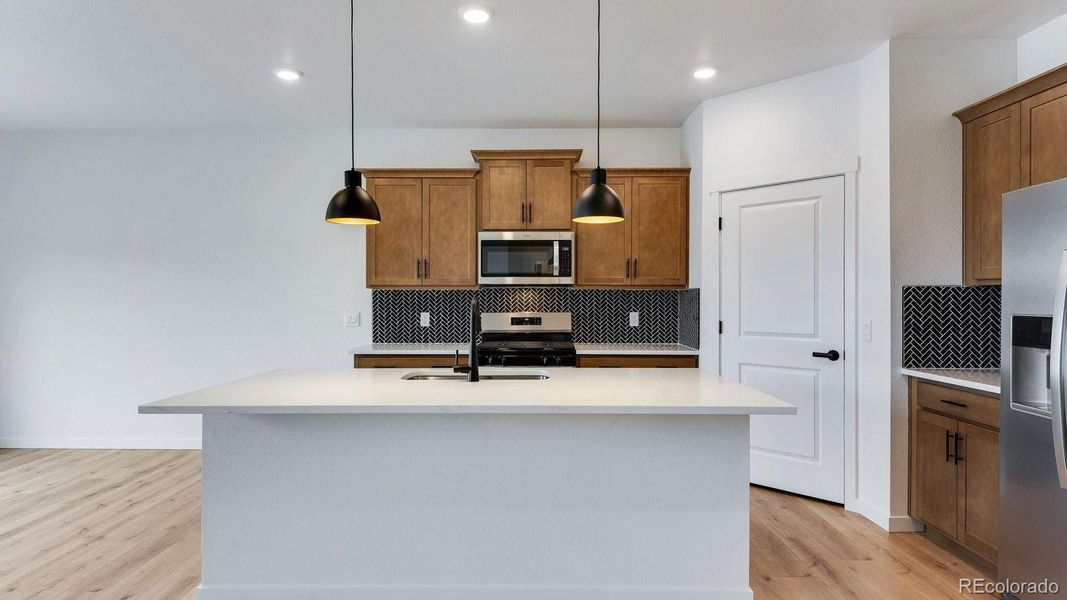 Furnished interior view inside a new home in Trails at Crowfoot, Parker (Image 8).