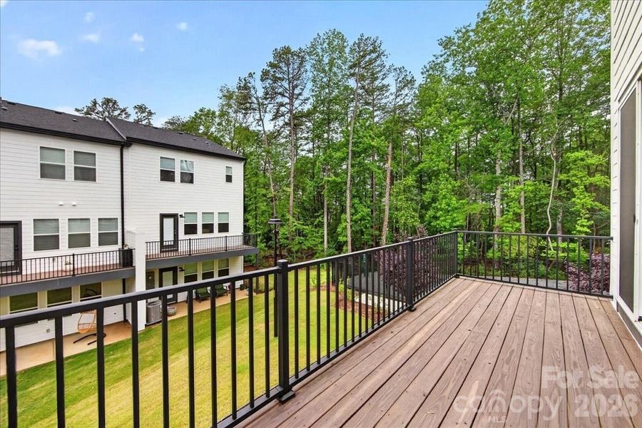Second floor outdoor living with tree-line views Second floor outdoor living with tree-line views