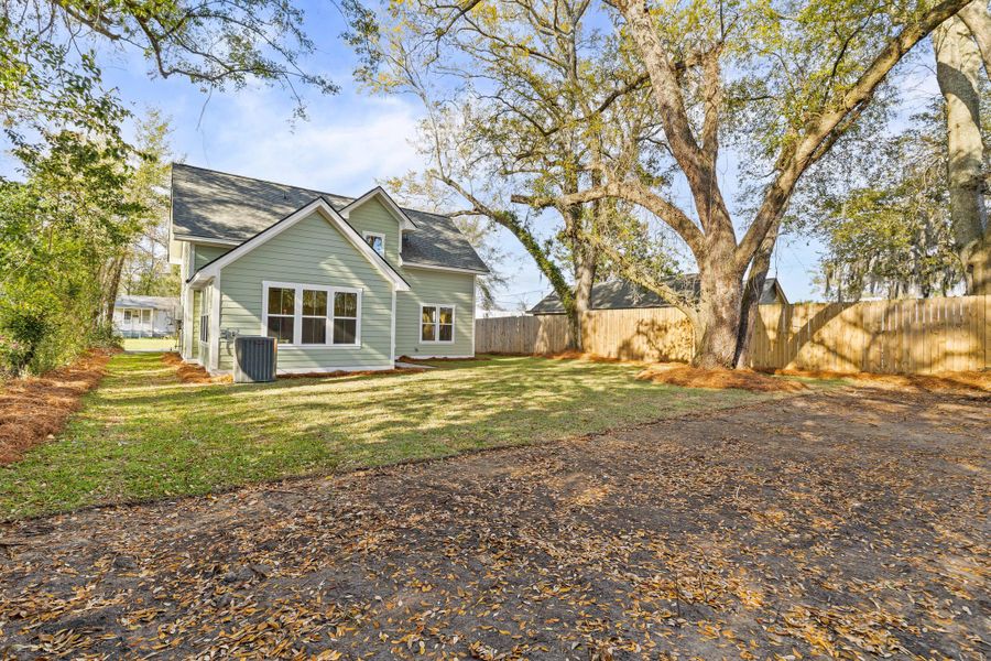 Exterior details and patio area of a home in Park Circle Single Family Homes, North Charleston (Image 3).