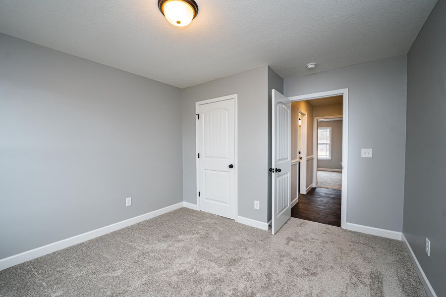 Representative unfurnished interior of a home built from the Saxon by Enchanted Homes in Guadalupe Heights, Seguin (Image 40).