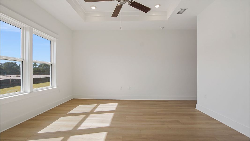 Representative unfurnished interior of a home built from the Magnolia by D.R. Horton in Breakfast Point East Phase II, Panama City Beach (Image 25).