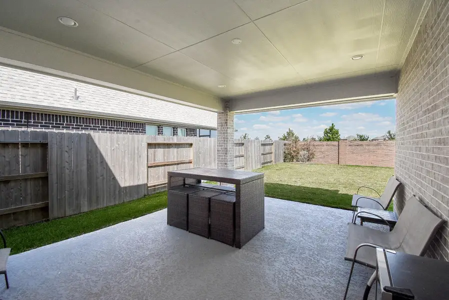 Exterior details and patio area of a home in Marvida, Cypress (Image 29).