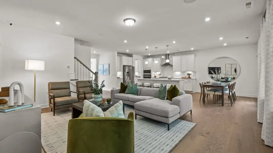 Inviting family room and gourmet kitchen in the two-story single family Townsend plan by DRB Homes in York, SC. Inviting family room and gourmet kitchen in the two-story single family Townsend plan by DRB Homes in York, SC.