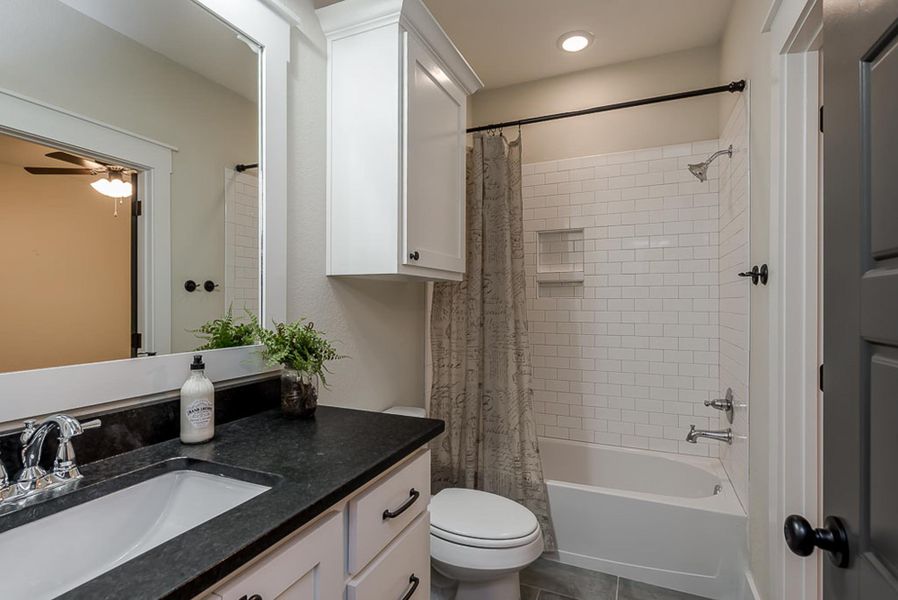 Representative furnished interior of a home built from the The Emily by Reece Homes in Oakmont, Bryan (Image 28).