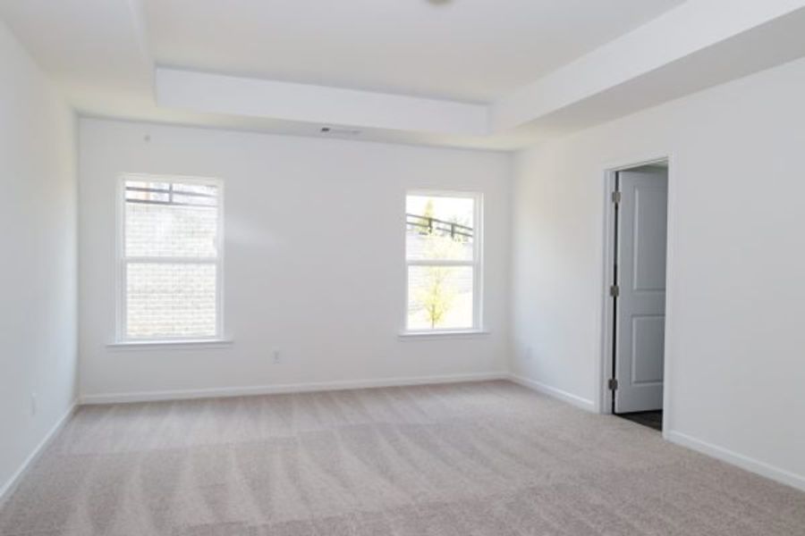 Representative unfurnished interior of a home built from the Emory Townhome by Piedmont Residential in The Retreat at Browns Ridge, Newnan (Image 29).