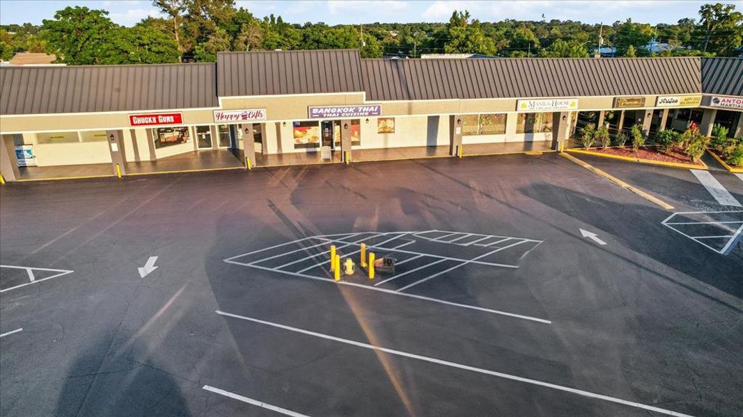 Front exterior of a new home in Twisted Oaks, Beverly Hills, FL, highlighting curb appeal (Image 18).